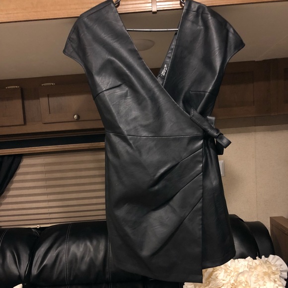 Topshop Dresses & Skirts - TopShop black leather wrap dress, NWT NEVER WORN
